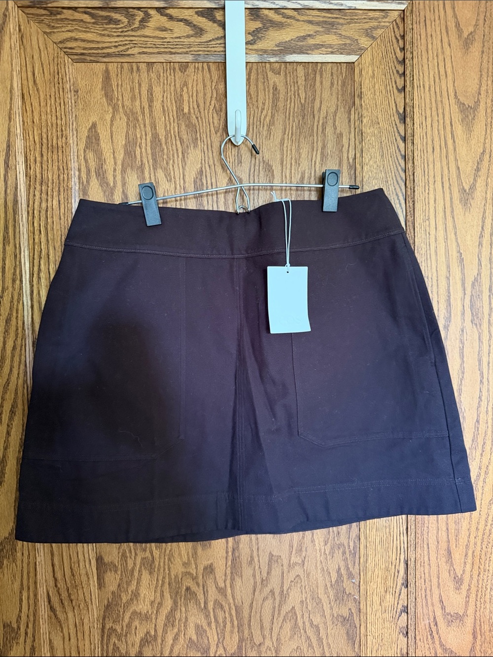 COS Dark Brown 100% cotton, mini skirt with back zipper.